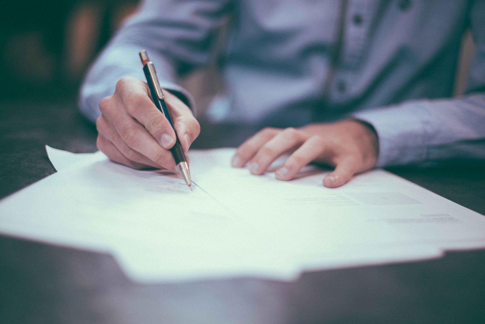Legal document being prepared and signed