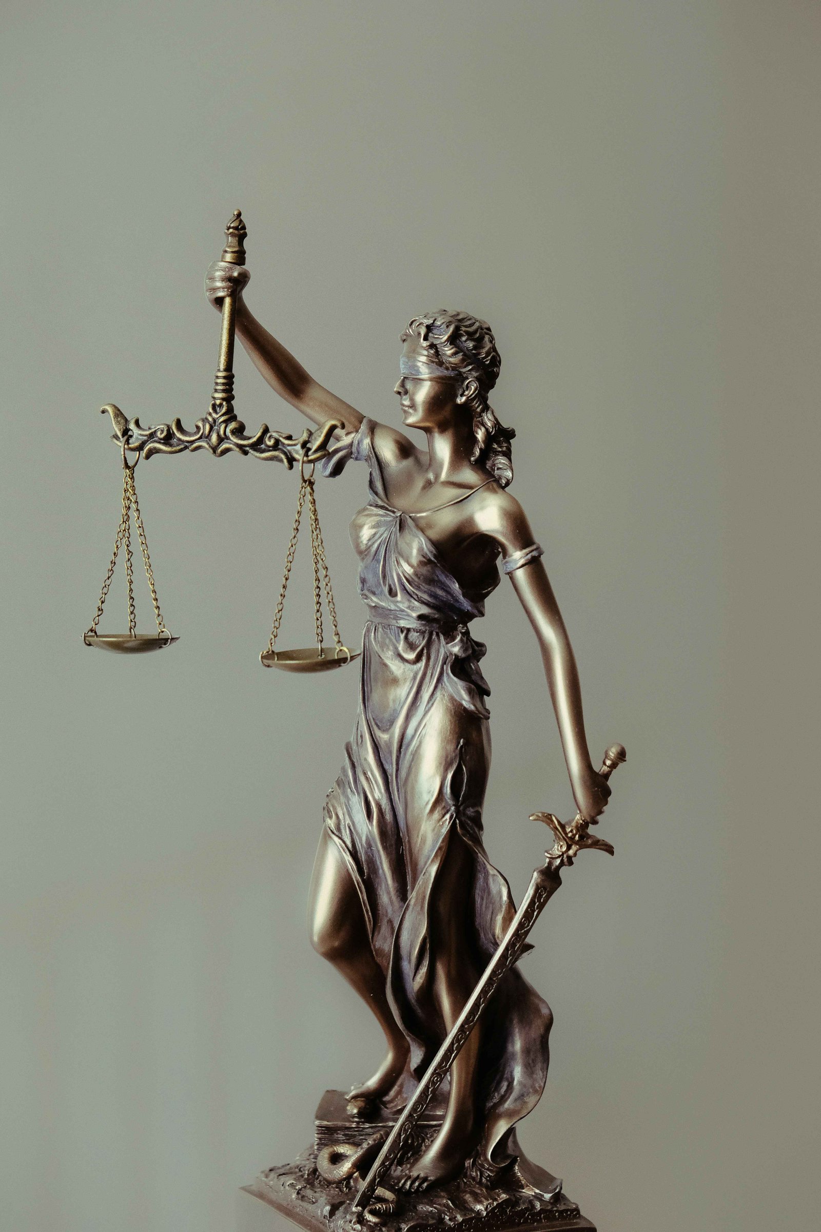 Statue of Lady Justice holding the scales of justice