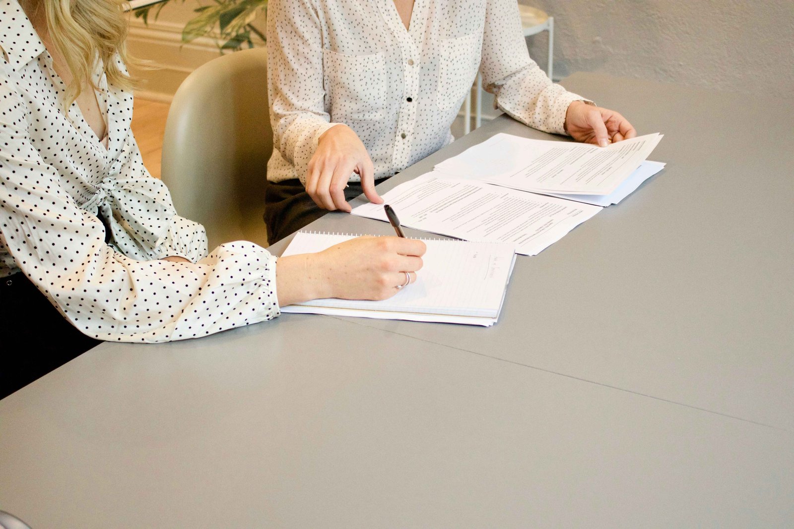 Consultation over paperwork at a desk